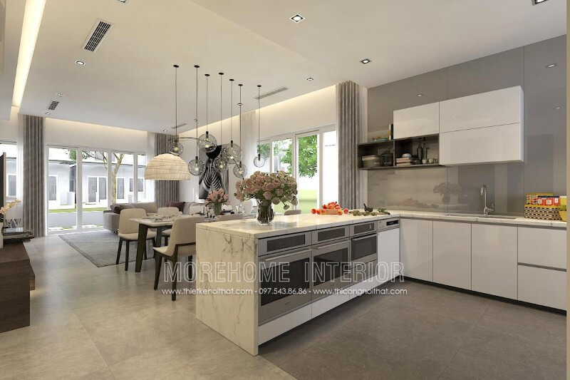 Tủ bếp gỗ công nghiệp màu trắng kết hợp với đá ốp bếp màu bóng màu lông chuột tạo nên một không gian bếp thật thông thoáng và tươi mới. Tủ bếp đẹp