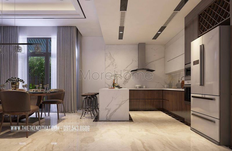 Phòng bếp của Trần Thạch Cao được thiết kế phẳng và được trang bị đèn âm tường để tạo ra một không gian ấm cúng.